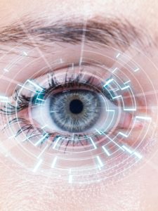 closeup-of-womans-blue-eye-high-technologies-picture-id618450126