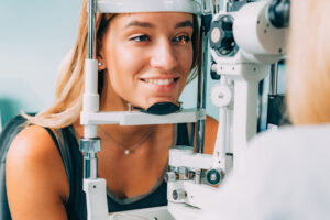 A doctor examining a patient’s eyes for presbyopia